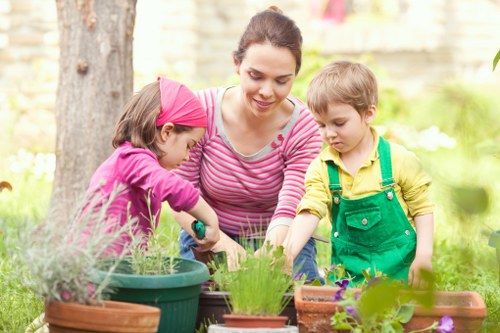 Gardening crew discussing a free on-site quote